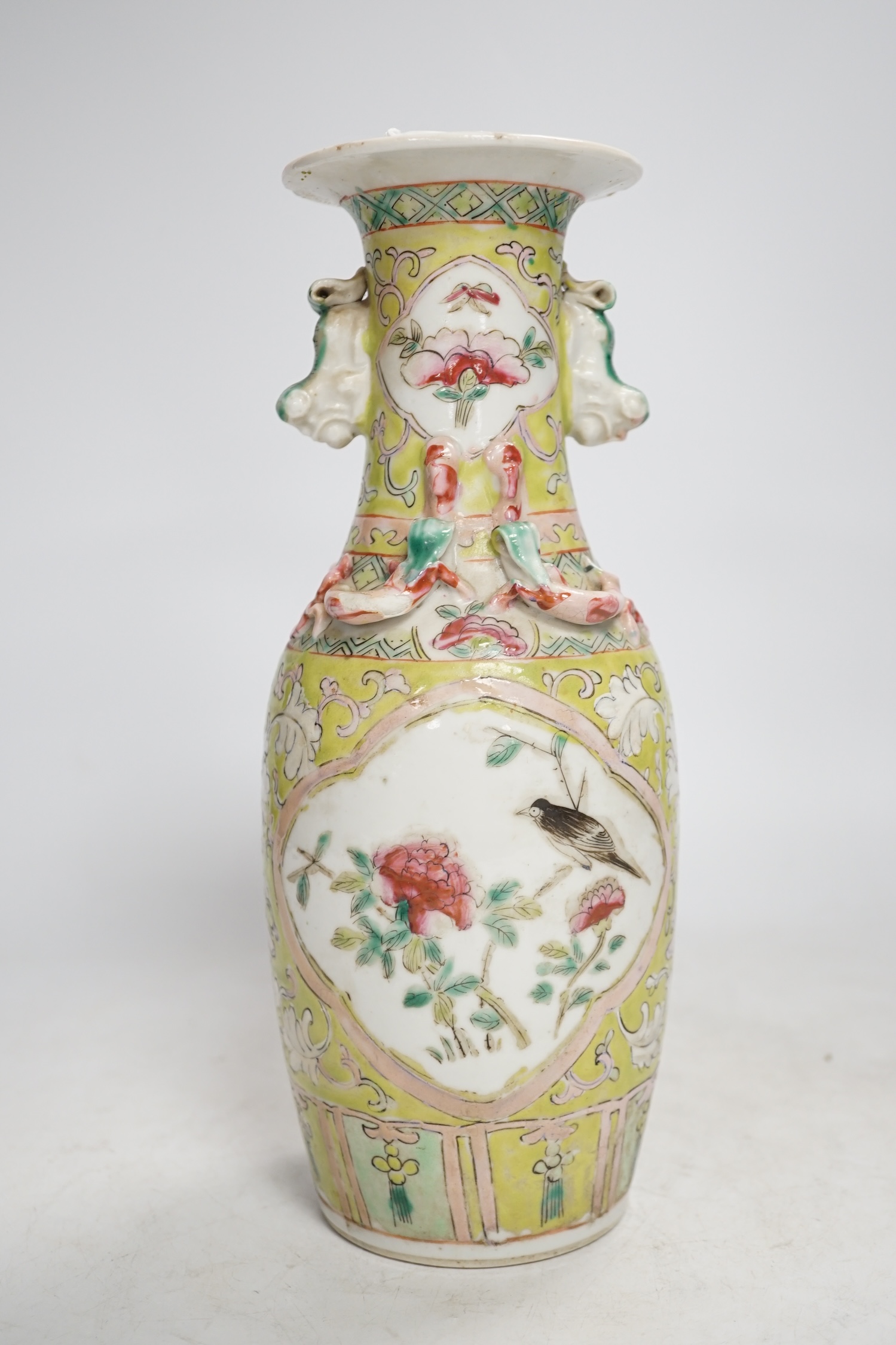 A 19th century Chinese vase, for the Malaysian Straits market, 25cm high. Condition - some minor chips to neck lip, fair